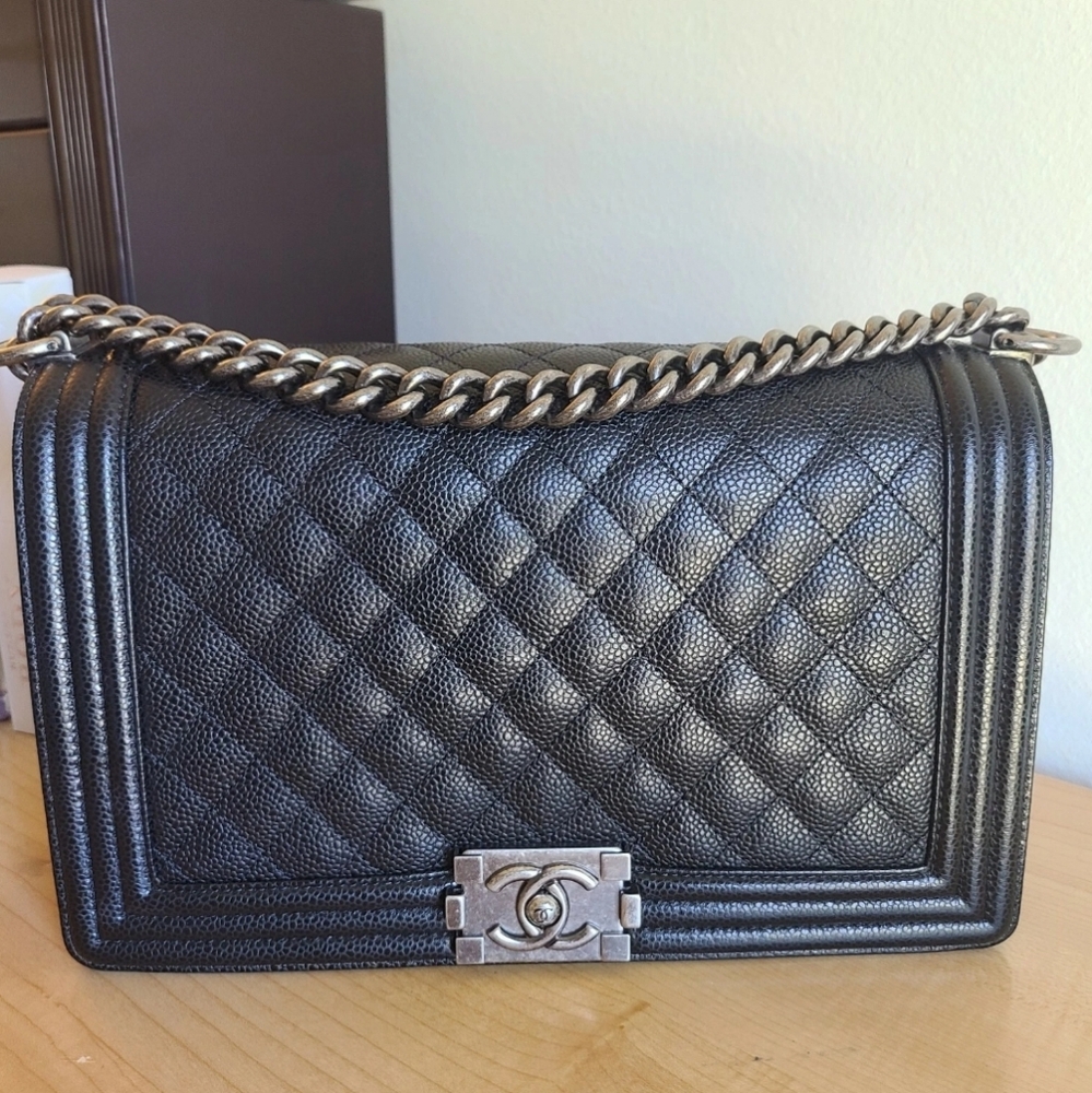 Authentic Chanel Black New Medium Boy in Caviar Leather and Ruthenium Hardware